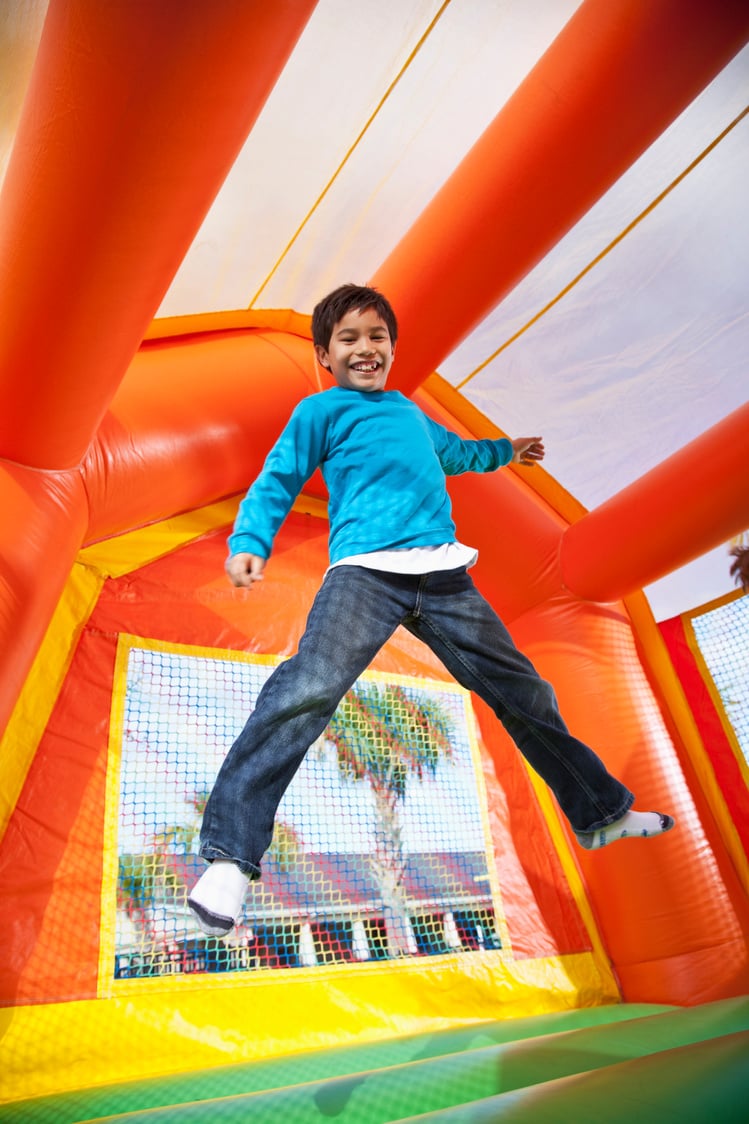 Boy in bounce house